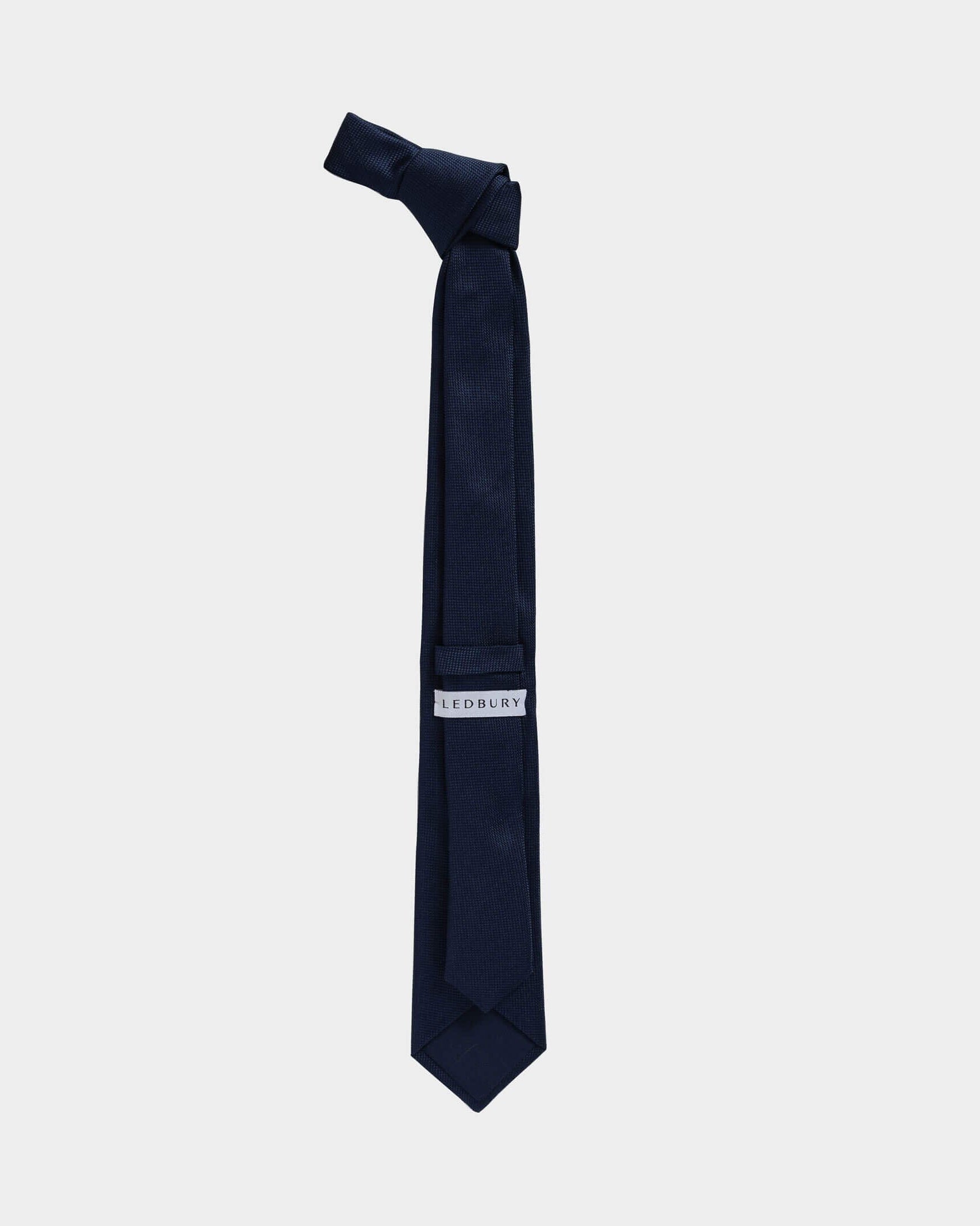 Full length back view of the Navy Barone silk tie — modern width by Ledbury