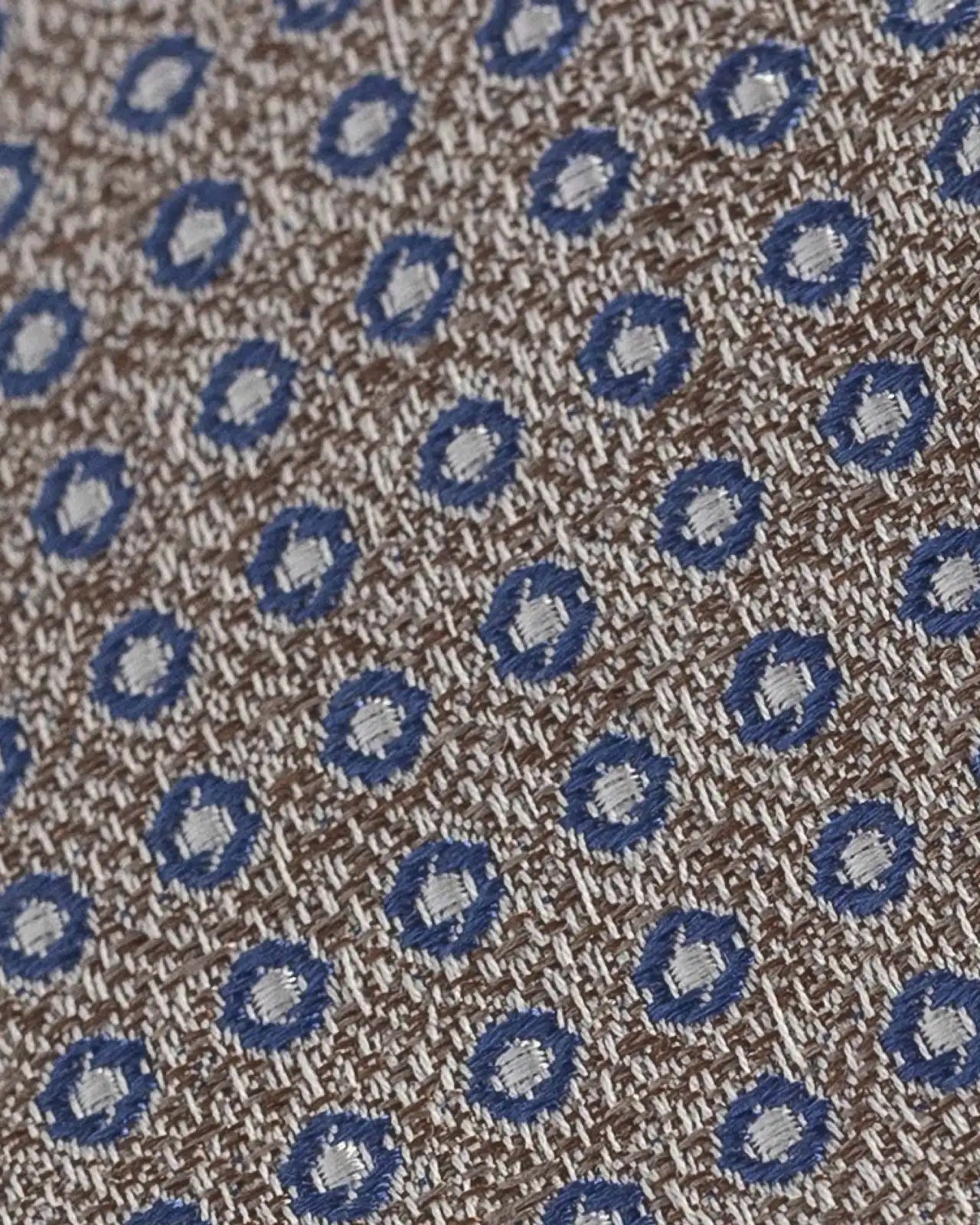Close-up of Ledbury Oat Potenza Silk Linen Tie showing satin weave texture and sheen