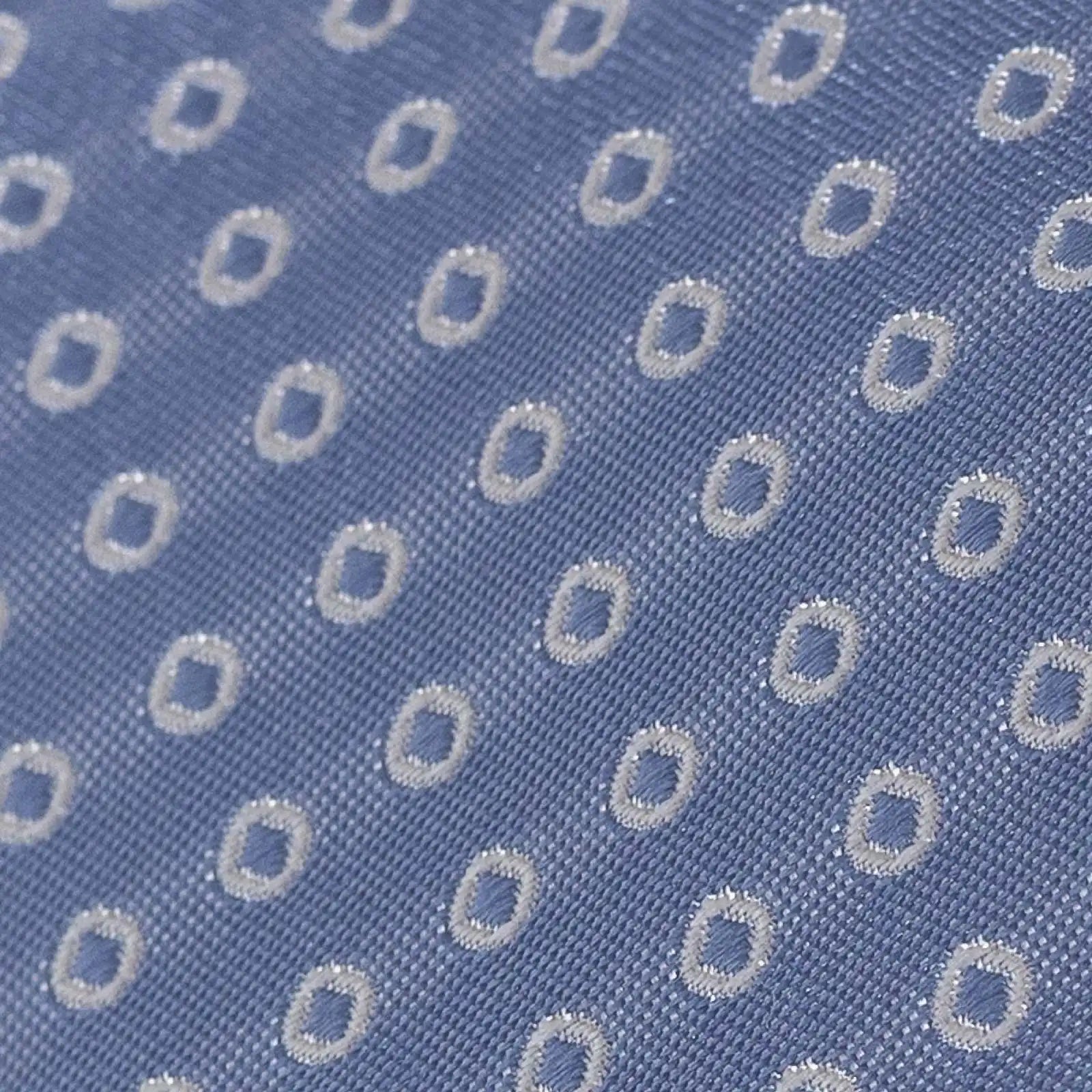 Close-up of Ledbury Light Blue Fonda Dot Silk Tie showing jacquard dot pattern and sheen