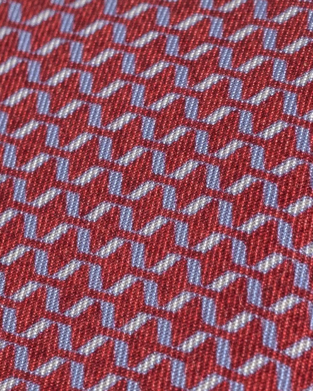 Close-up of Ledbury Red Acardi Silk Tie showing printed pattern and satin sheen