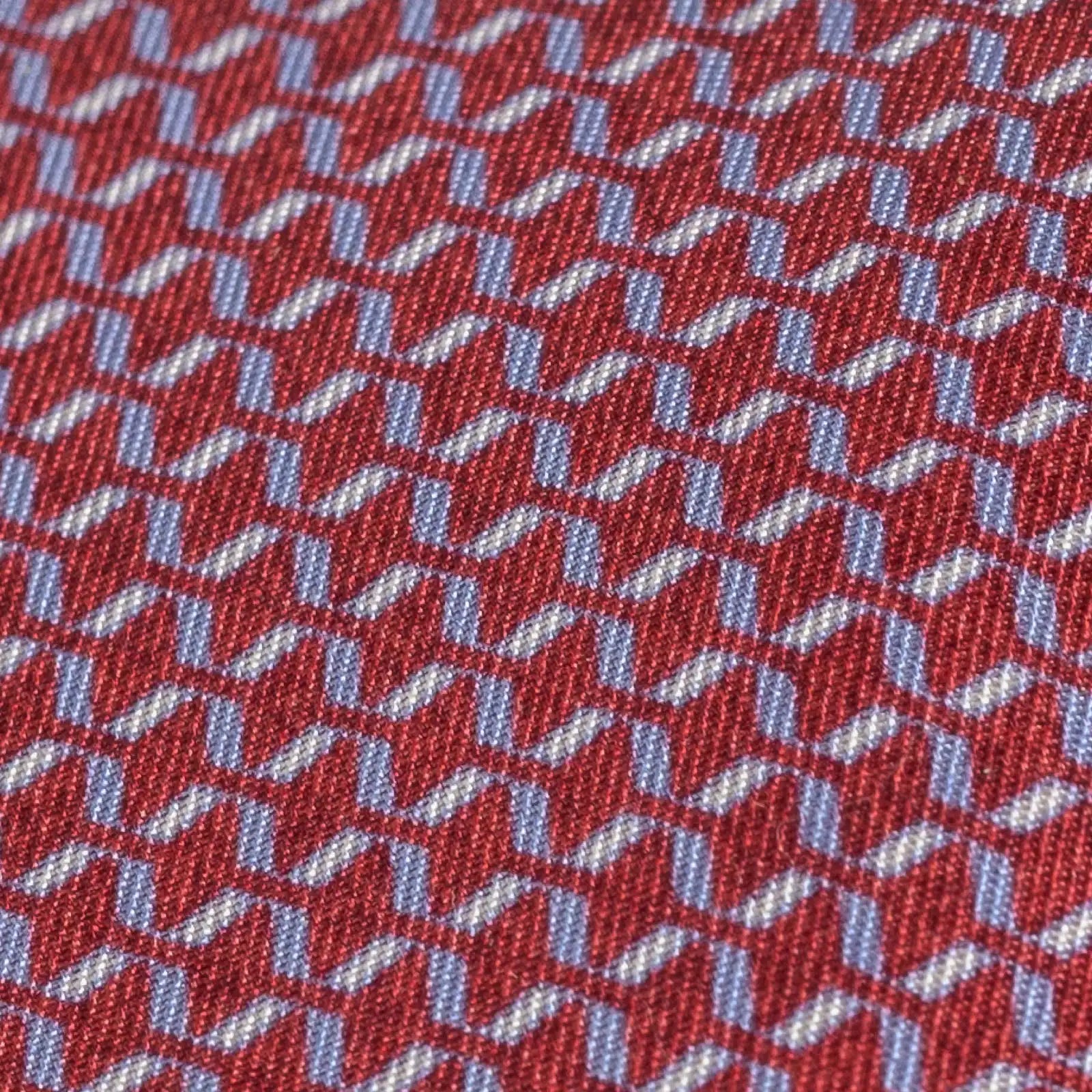 Close-up of Ledbury Red Acardi Silk Tie showing printed pattern and satin sheen