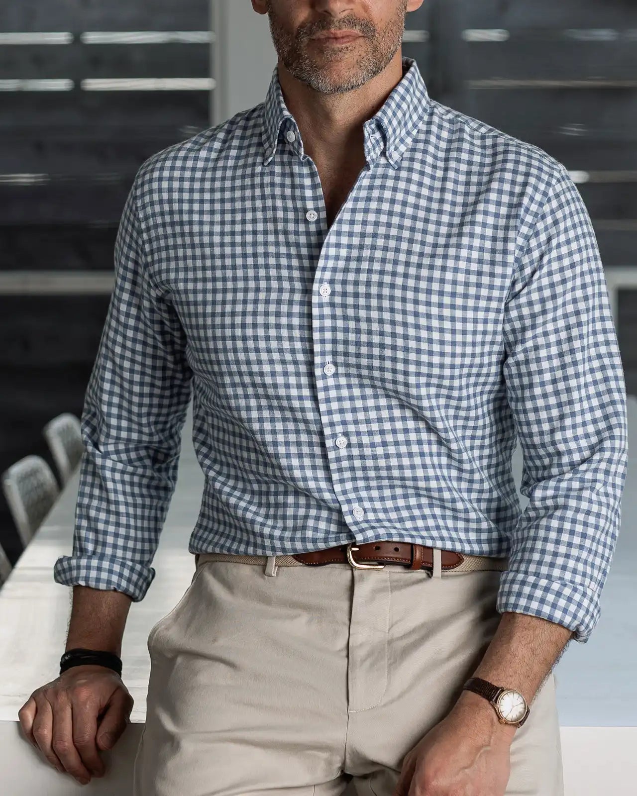 Light blue Farwell Gingham custom shirt worn with beige chinos — Ledbury