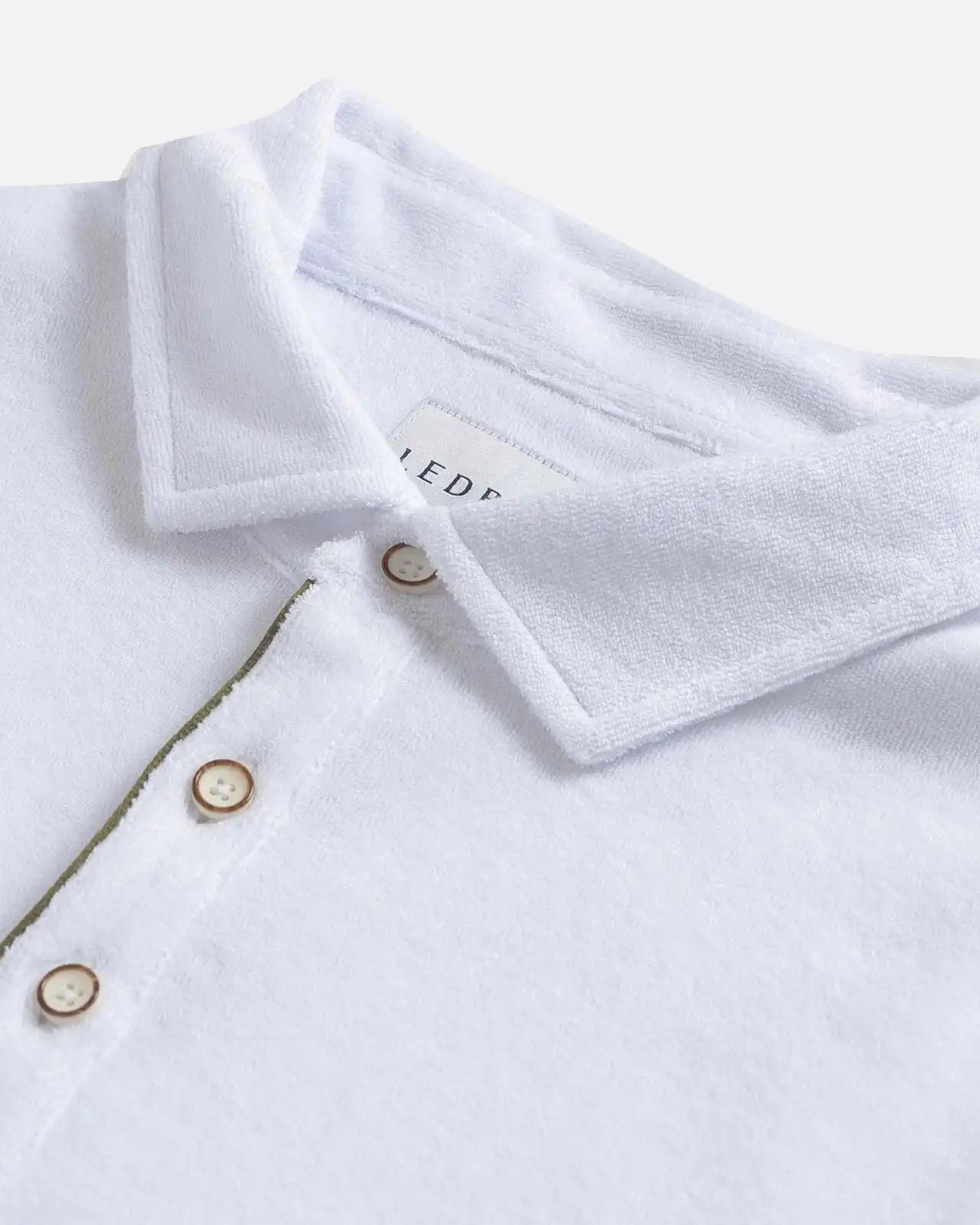 Polo collar detail on the White Clancy Terry Cloth Polo - Ledbury