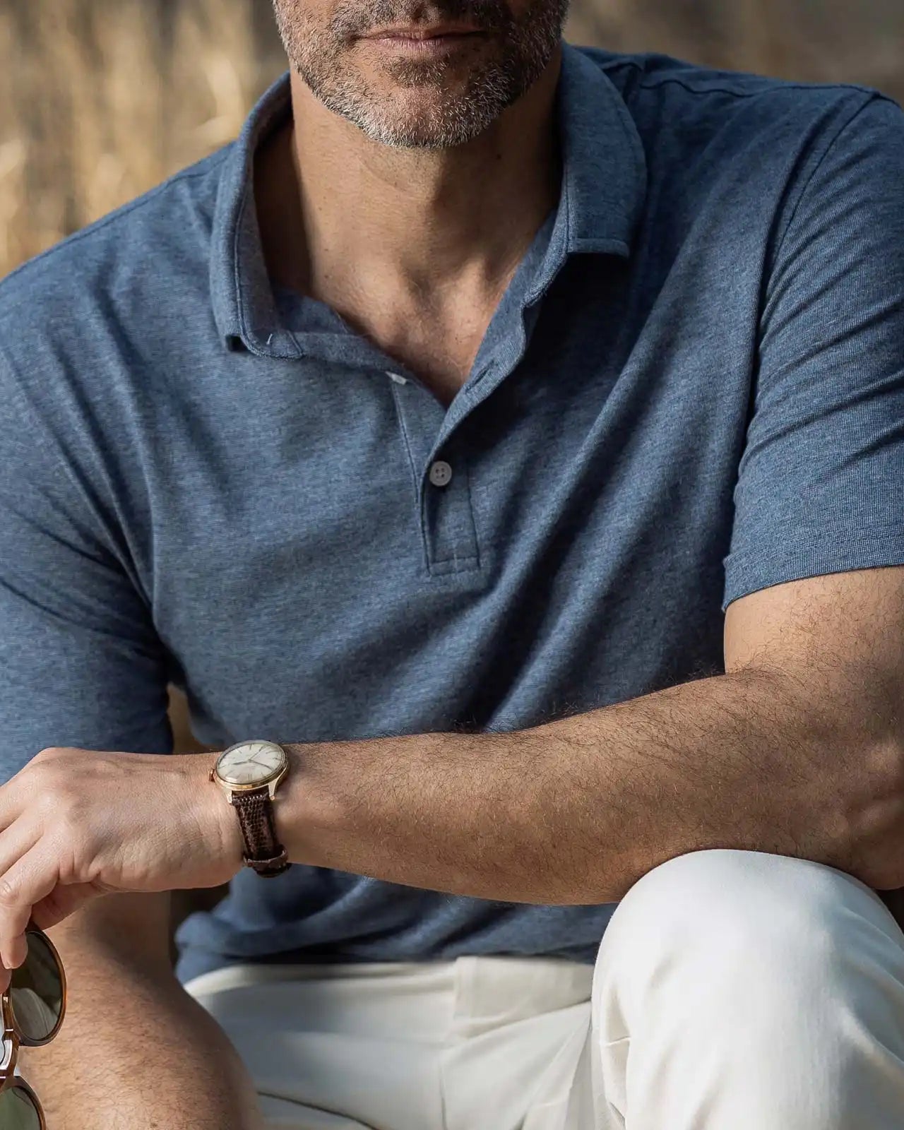 Lifestyle shot of the Ledbury Freeman Knit Custom Polo in Bay Blue