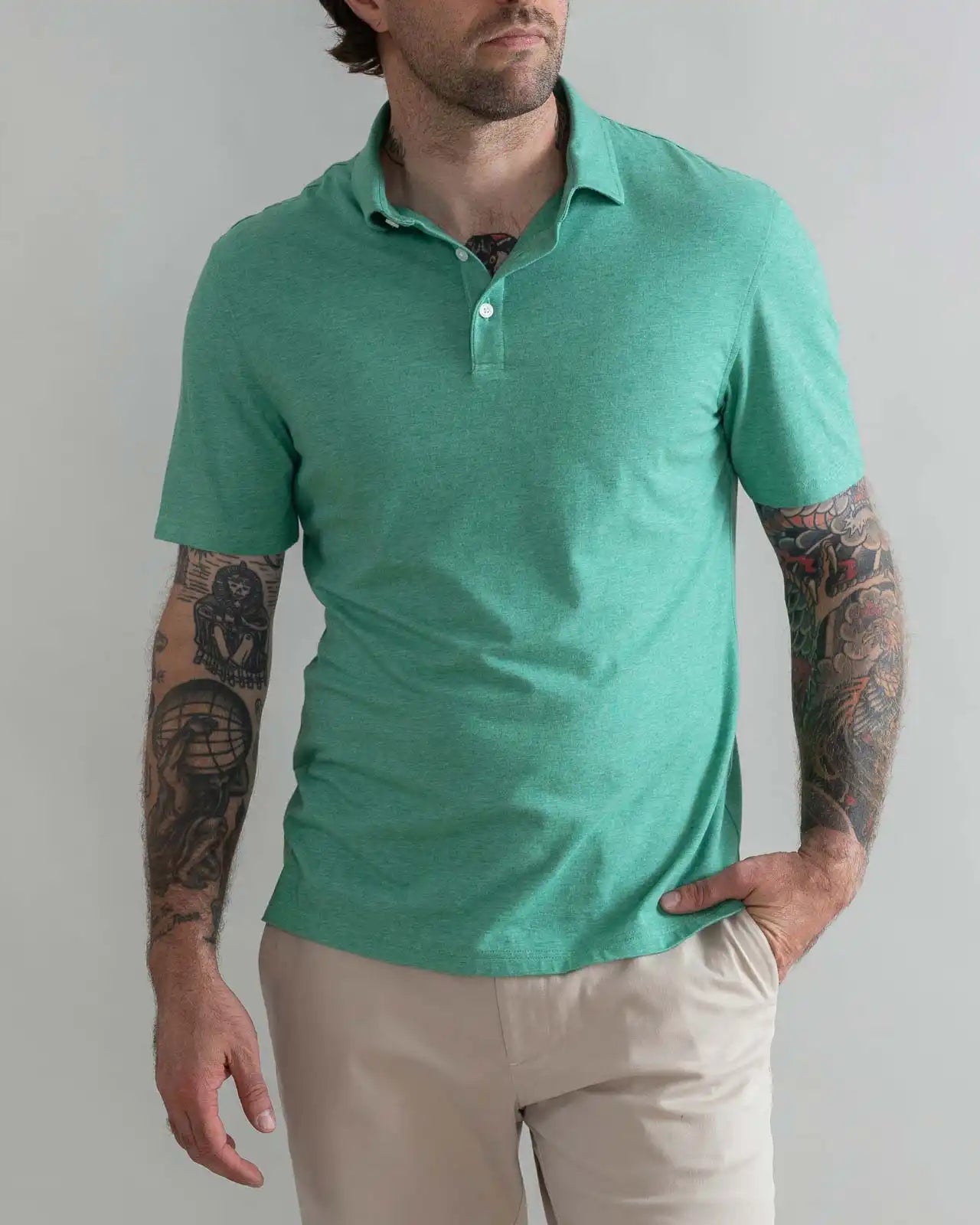 Model wearing the Ledbury Freeman Knit Custom Polo in Parakeet Green
