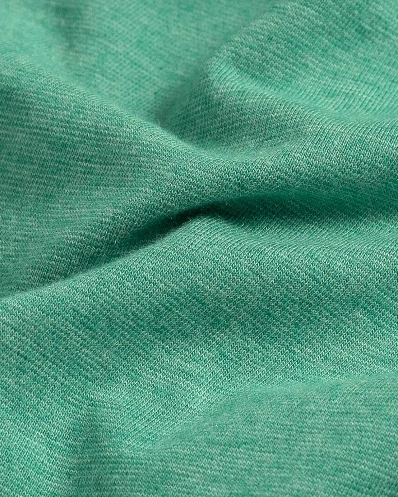 Fabric detail of the Ledbury Freeman Knit Custom Polo — cotton-modal jersey knit in Parakeet Green