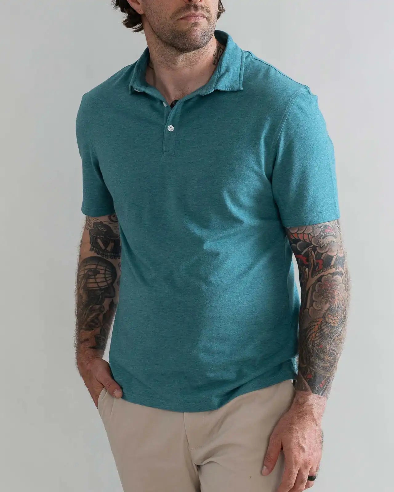 Model wearing the Ledbury Freeman Knit Custom Polo in Teal