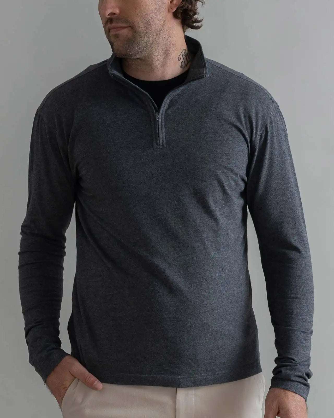 Man wearing Ledbury Freeman Sport Quarter Zip in Charcoal Grey with khaki trousers
