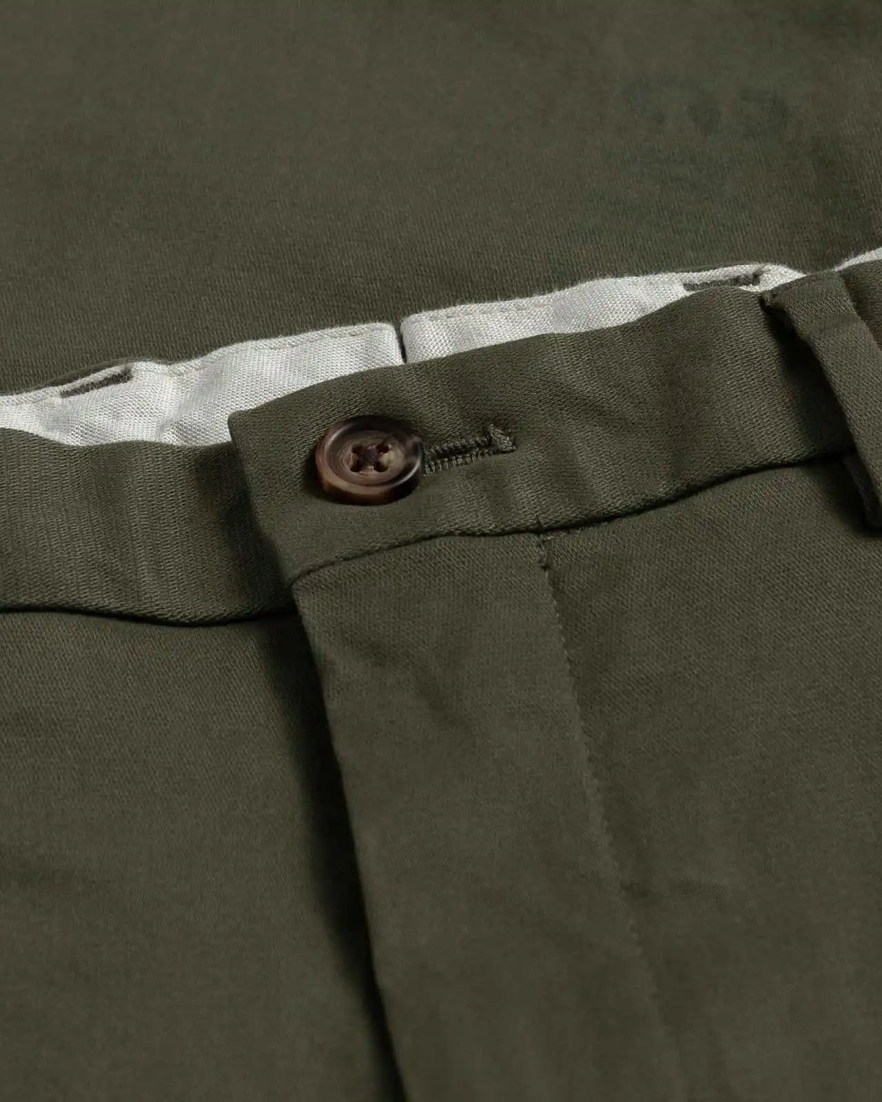 Stretch cotton twill chino fabric close-up - dark olive