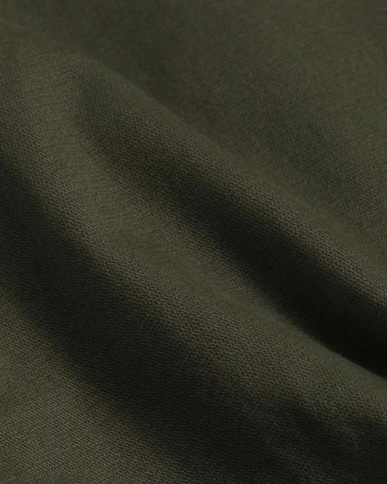 Dark olive chino pant fit and drape detail