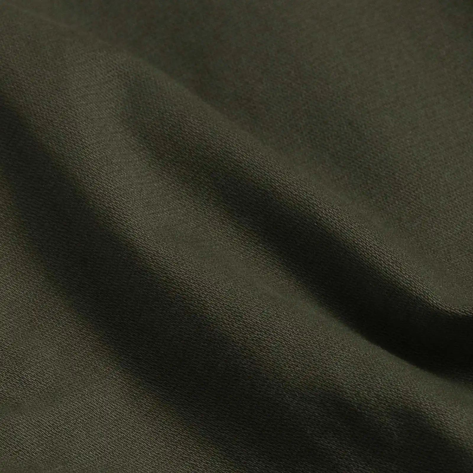 Dark olive chino pant fit and drape detail