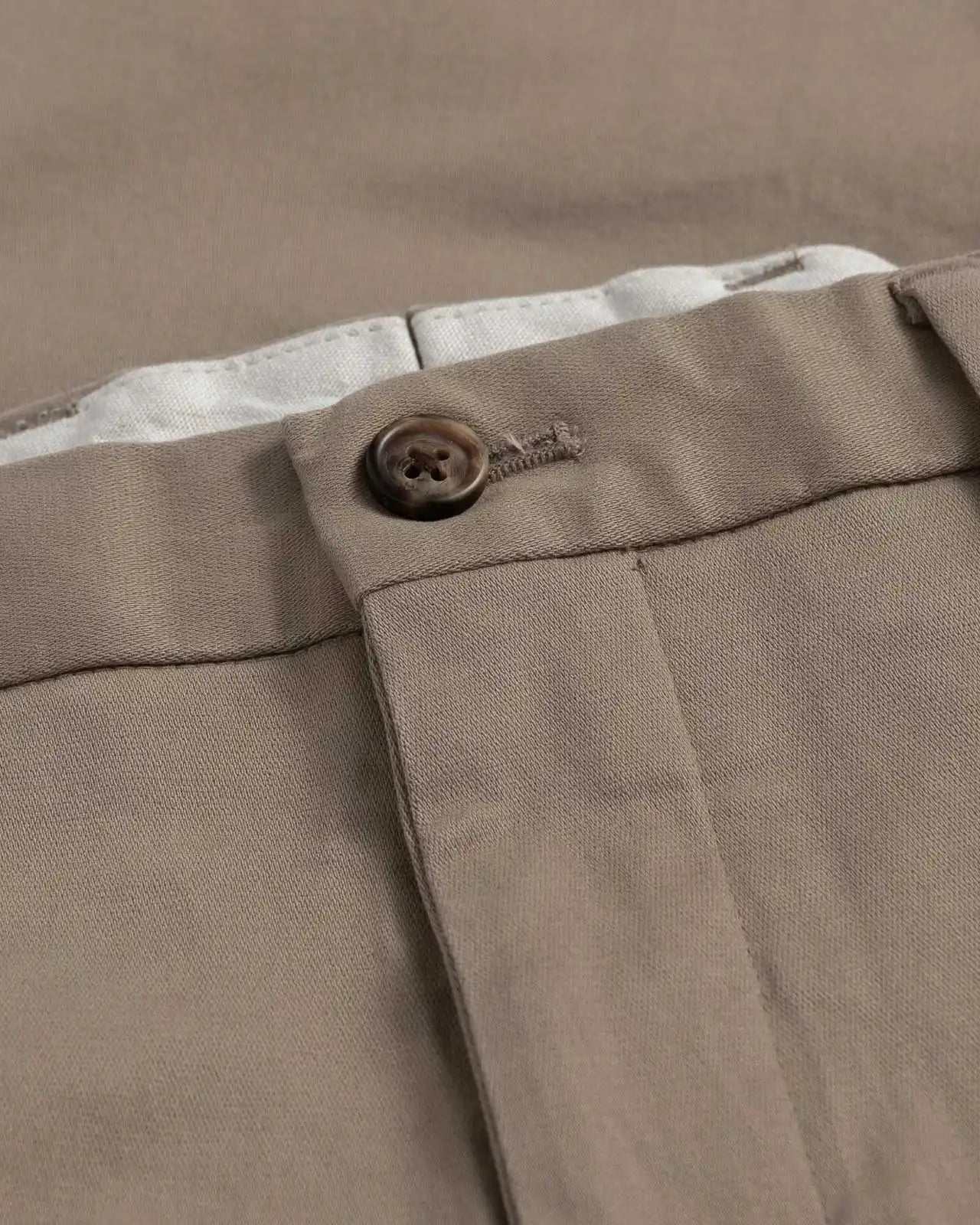 Stretch cotton twill chino waist construction close-up - dark khaki