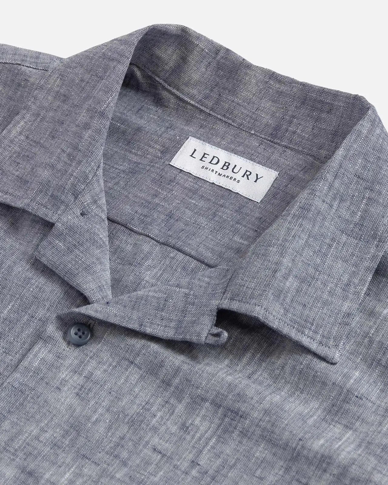 Camp collar detail on the Navy Blue Sandoval — open, flat-lying collar in slub cotton chambray