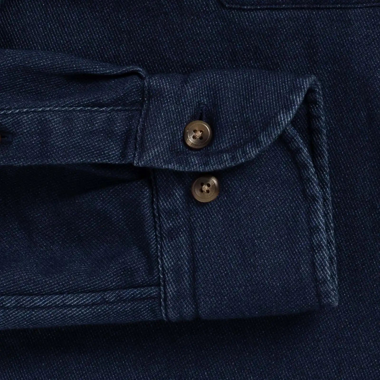 Indigo denim utility shirt cuff detail - double button-through design