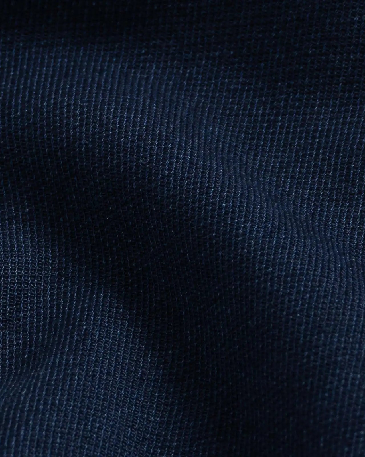 Indigo Lisden denim shirt fabric close-up - natural indigo dobby weave