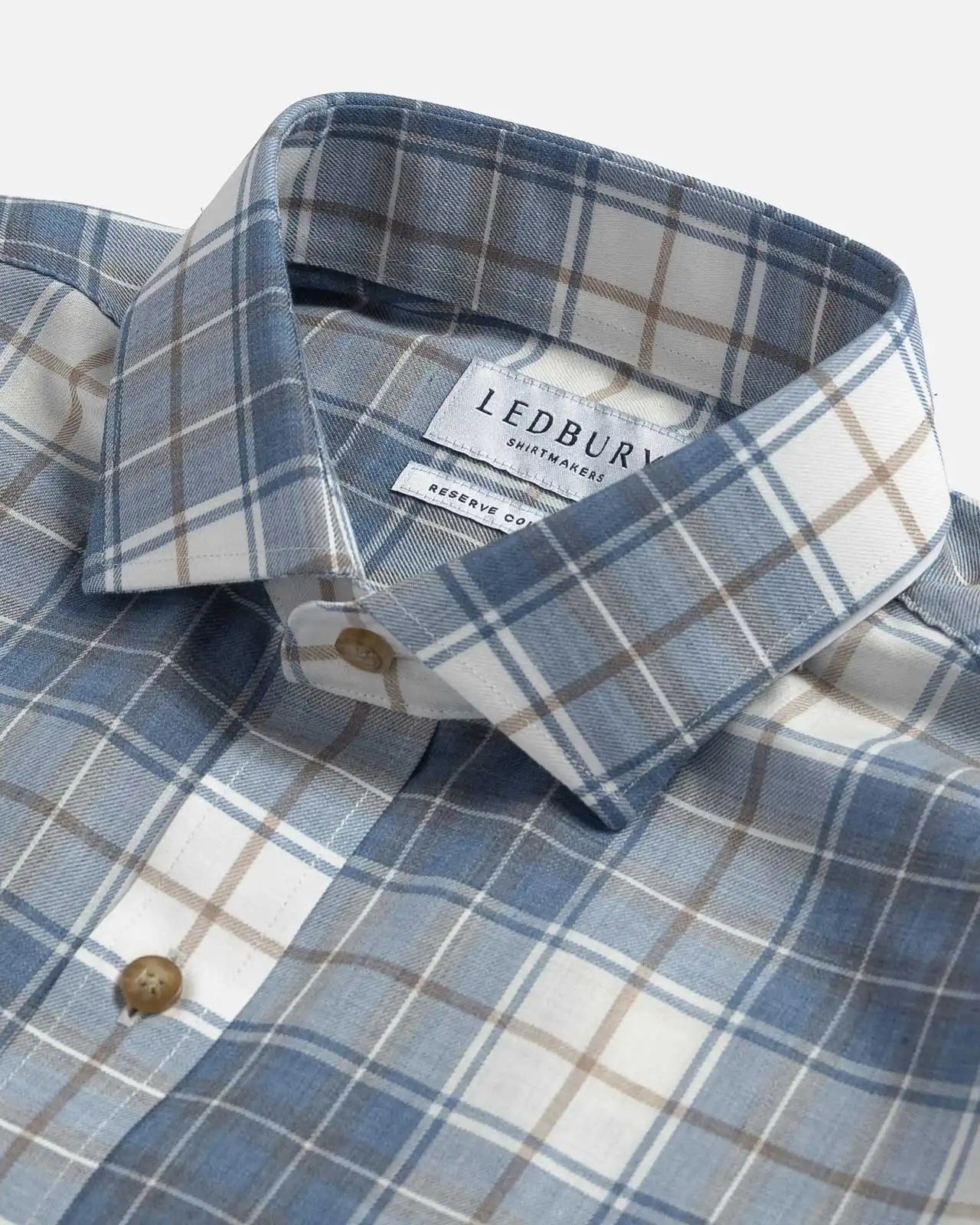 Close-up of the collar on the Ledbury Faded Blue Coulter Plaid Custom Shirt — customizable collar style