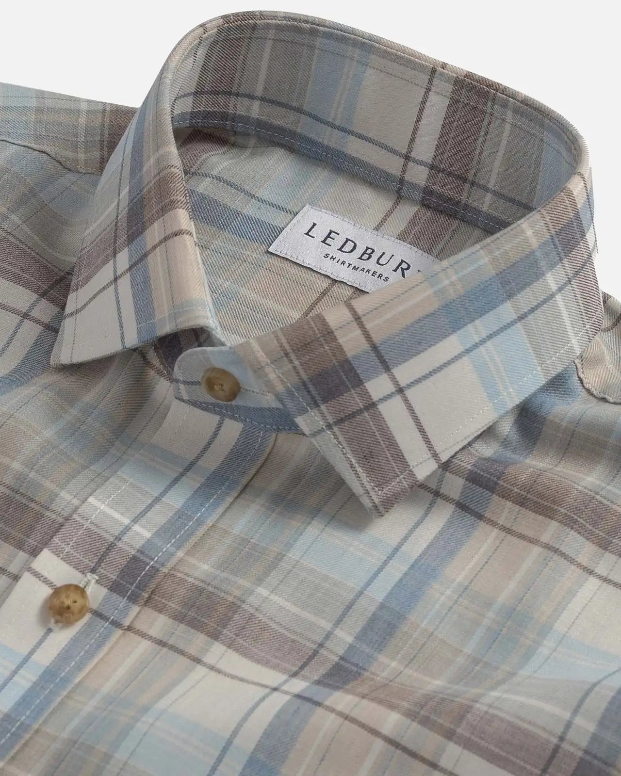 Close-up of the collar on the Ledbury Faded Desert Coulter Plaid Custom Shirt — customizable collar style