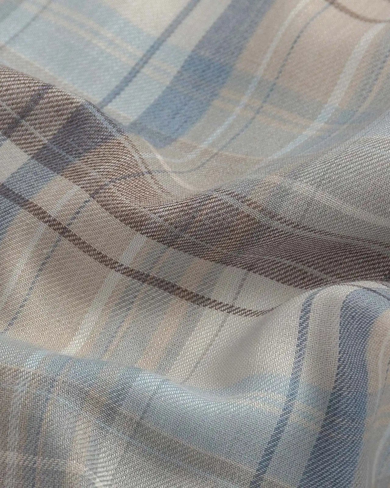 Fabric detail of the Ledbury Faded Desert Coulter Plaid Custom Shirt — lightweight Japanese recycled polyester and organic cotton blend