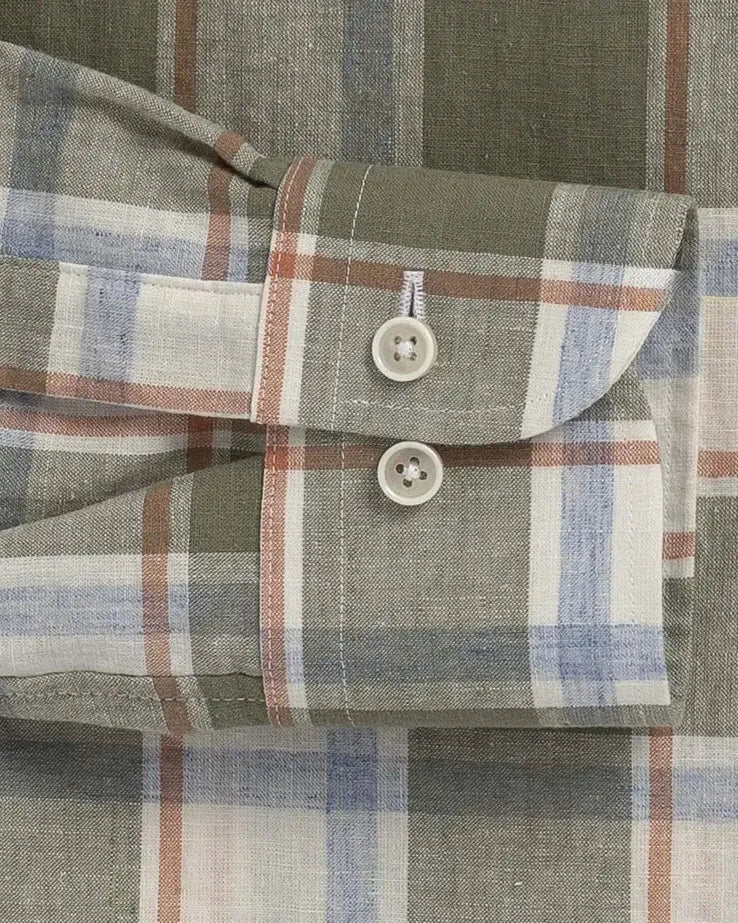 Double button barrel cuff and sleeve detail on the Faded Olive Royer linen shirt by Ledbury