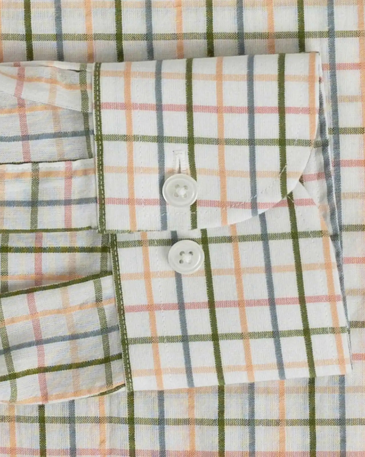 Double button barrel cuff detail on the Peach Santos Check custom shirt