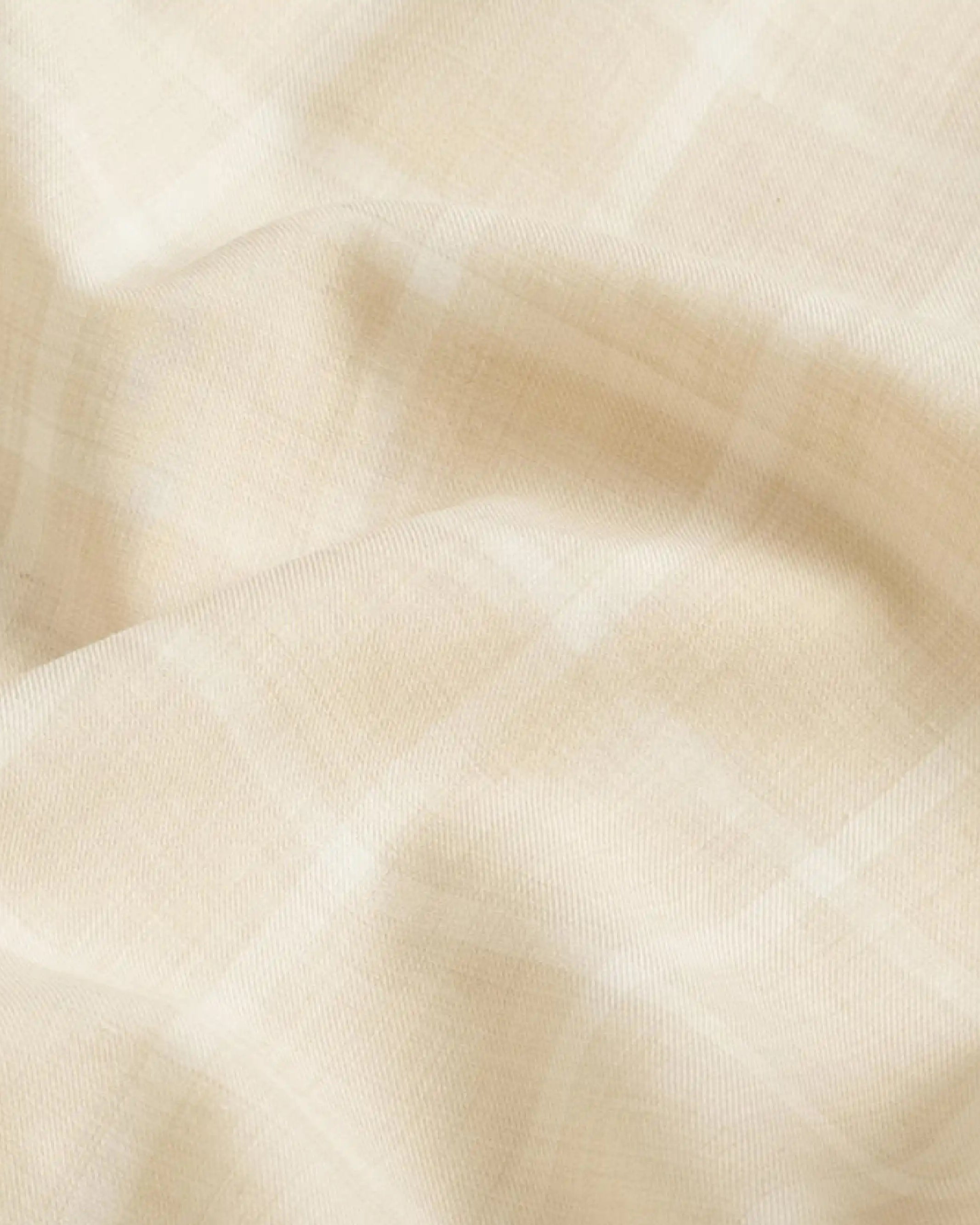 Close-up fabric detail of the wheat Albini Pritchard Italian checkered dress shirt