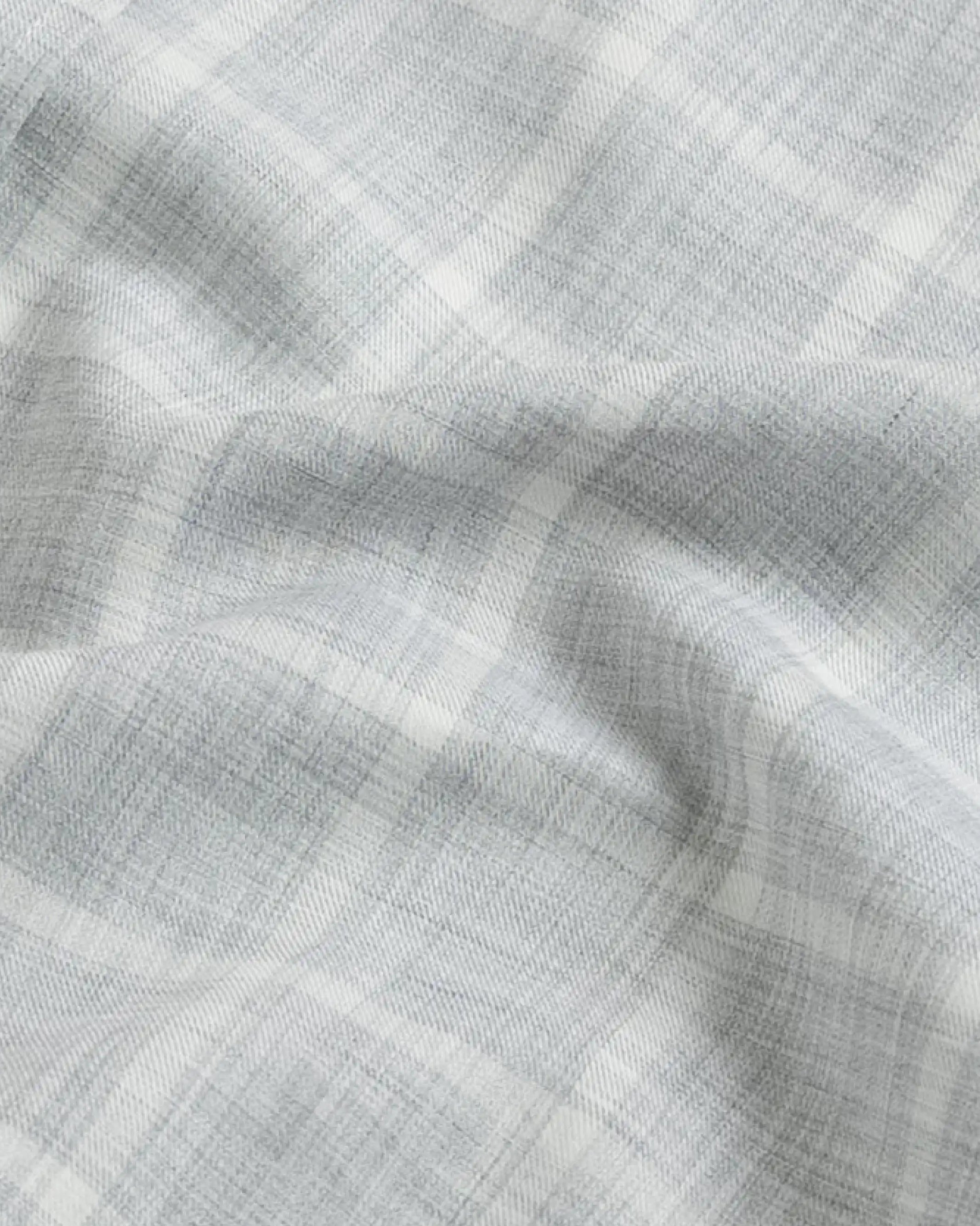 Close-up fabric detail of the grey Albini Pritchard Italian checkered dress shirt