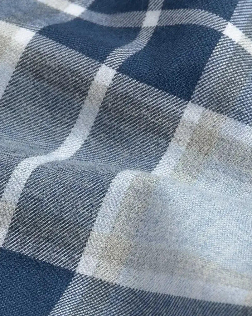 Close-up of blue and gray checkered brushed cotton fabric