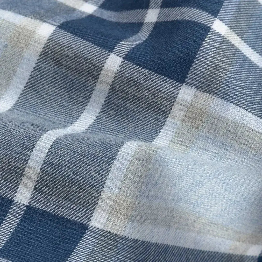Close-up of blue and gray checkered brushed cotton fabric