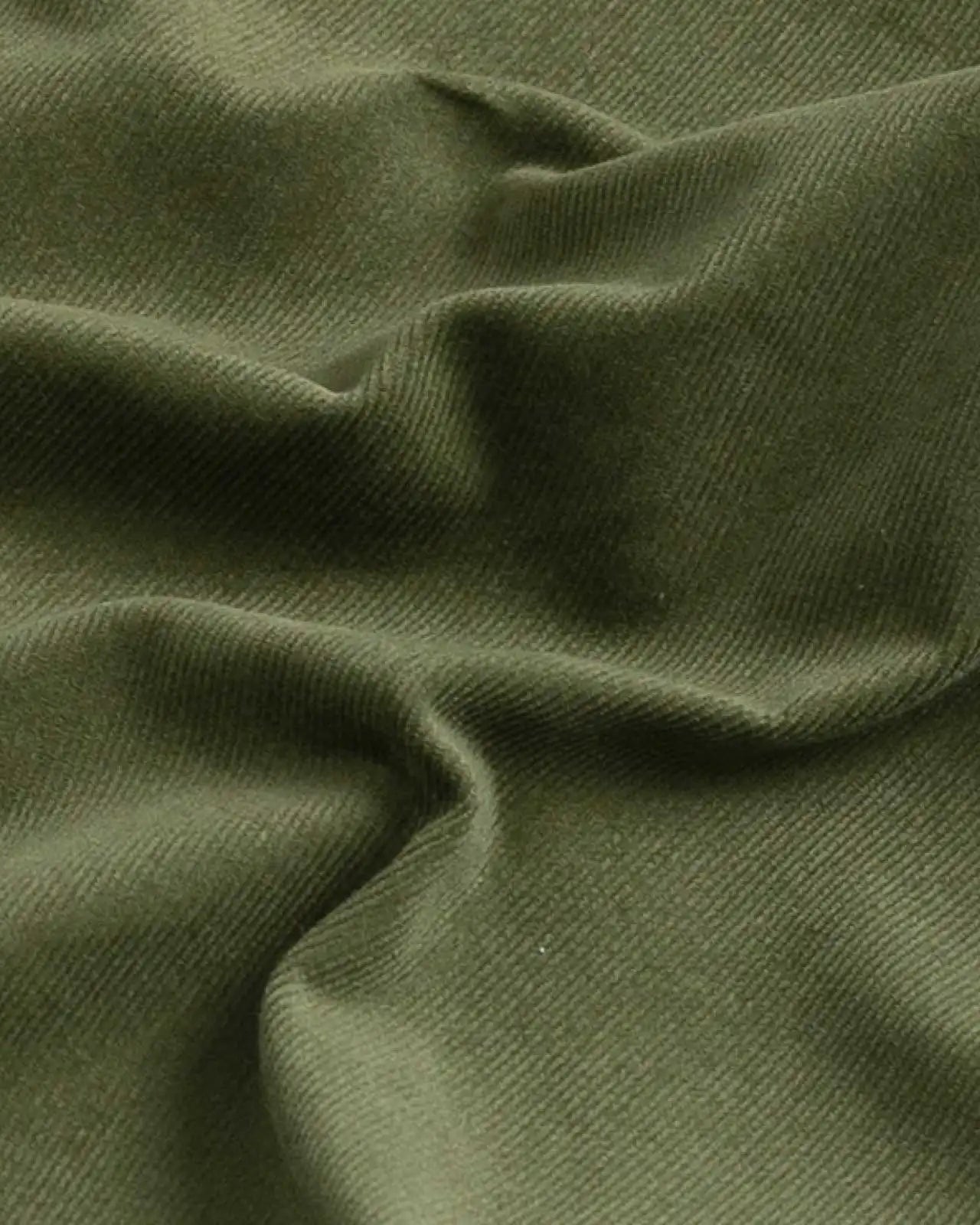 Custom corduroy shirt olive green fabric detail close-up