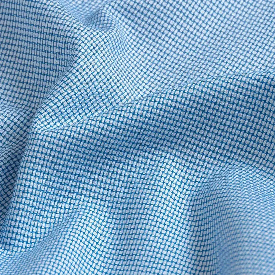 Custom dress shirt bright blue dobby pattern close-up