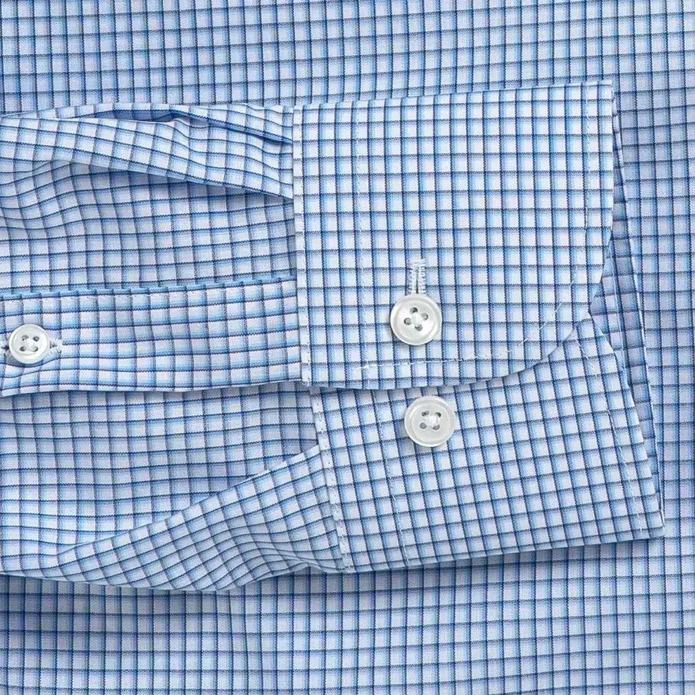 Blue check dress shirt cuff and sleeve construction detail