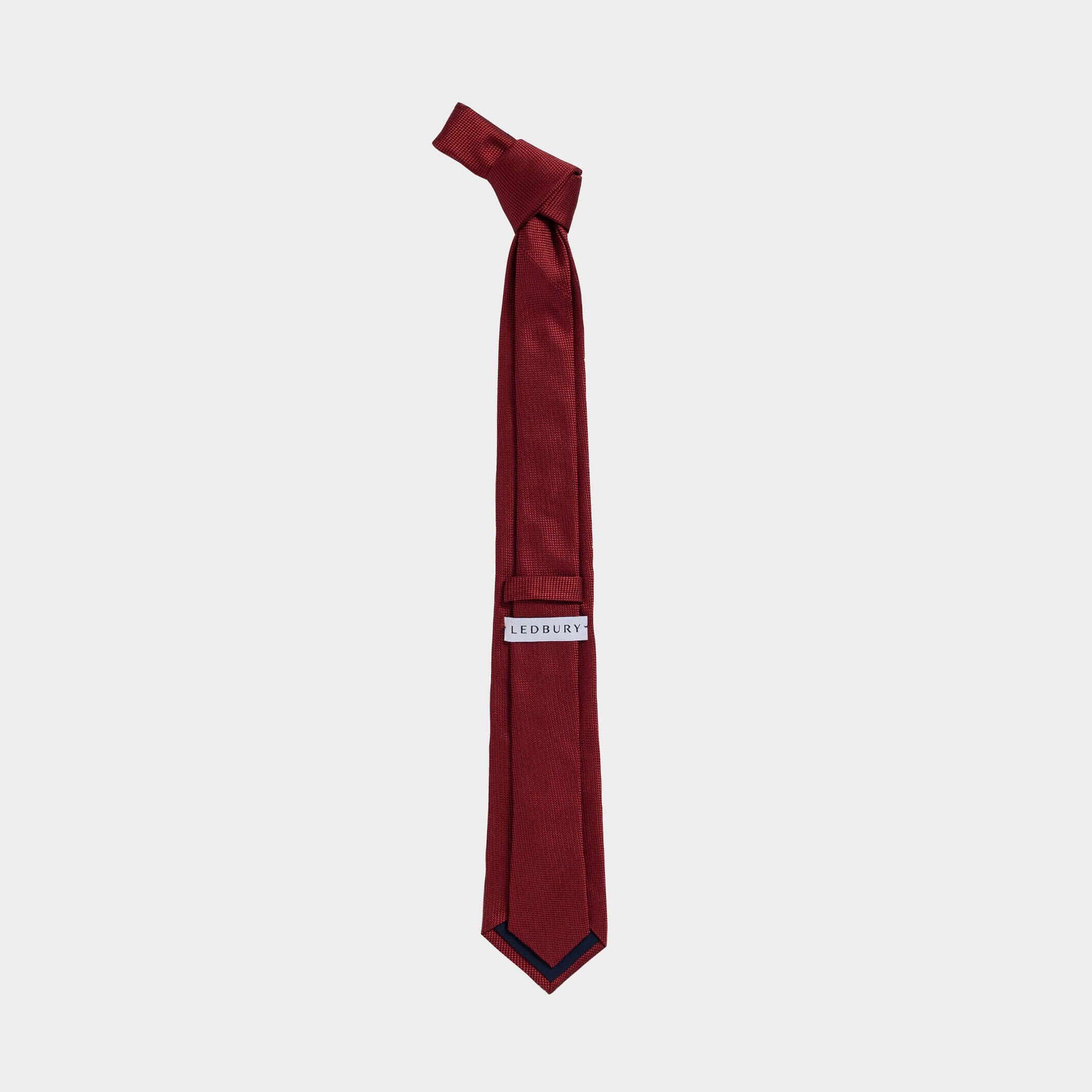 Full length back view of the Red Barone silk tie — 58 inches, modern width by Ledbury