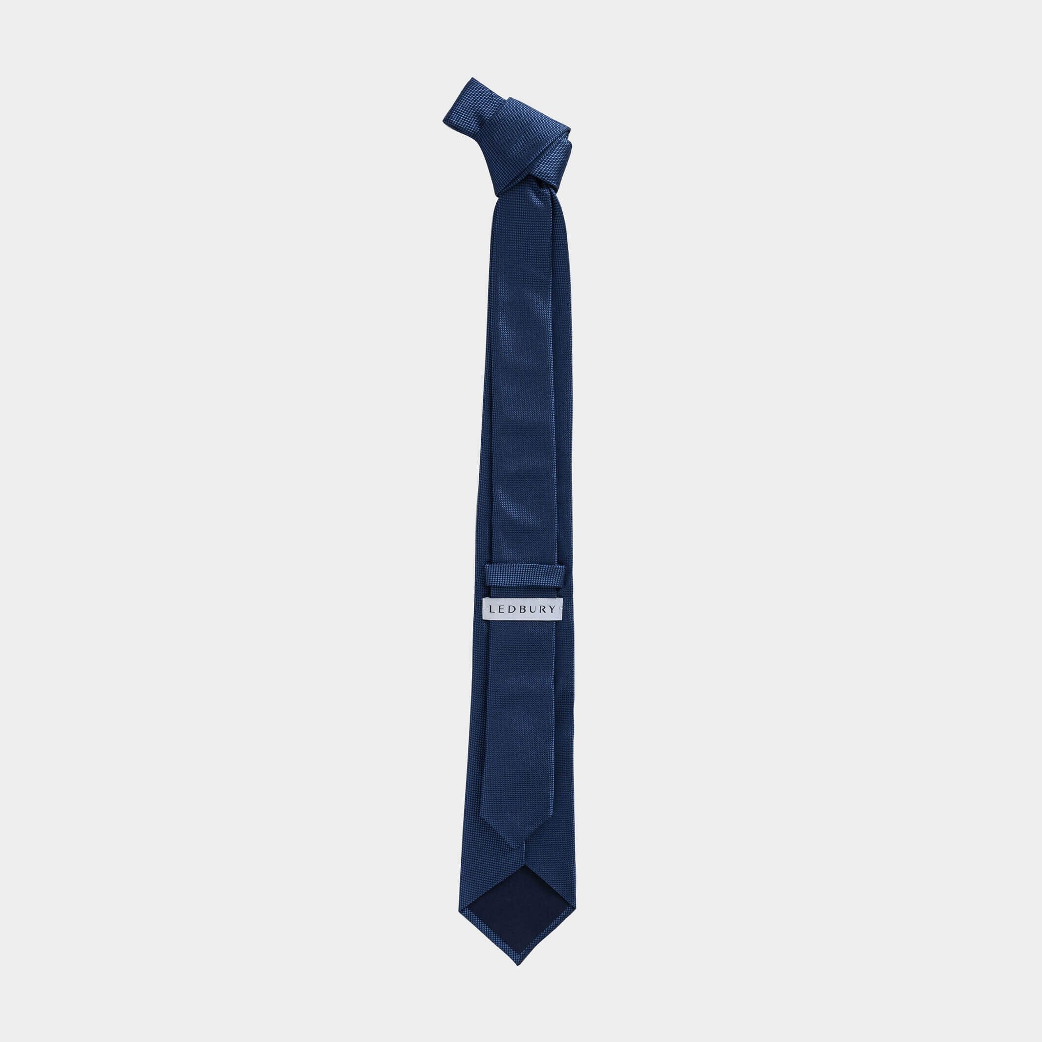 Full length back view of the Blue Barone silk tie — modern width by Ledbury