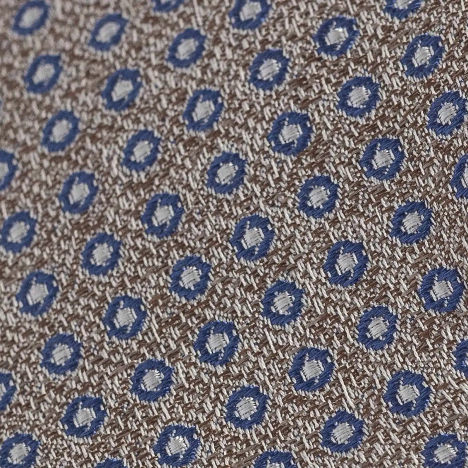 Close-up of Ledbury Oat Potenza Silk Linen Tie showing satin weave texture and sheen
