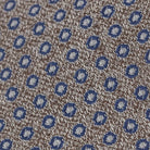 Close-up of Ledbury Oat Potenza Silk Linen Tie showing satin weave texture and sheen