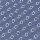 Close-up of Ledbury Light Blue Fonda Dot Silk Tie showing jacquard dot pattern and sheen