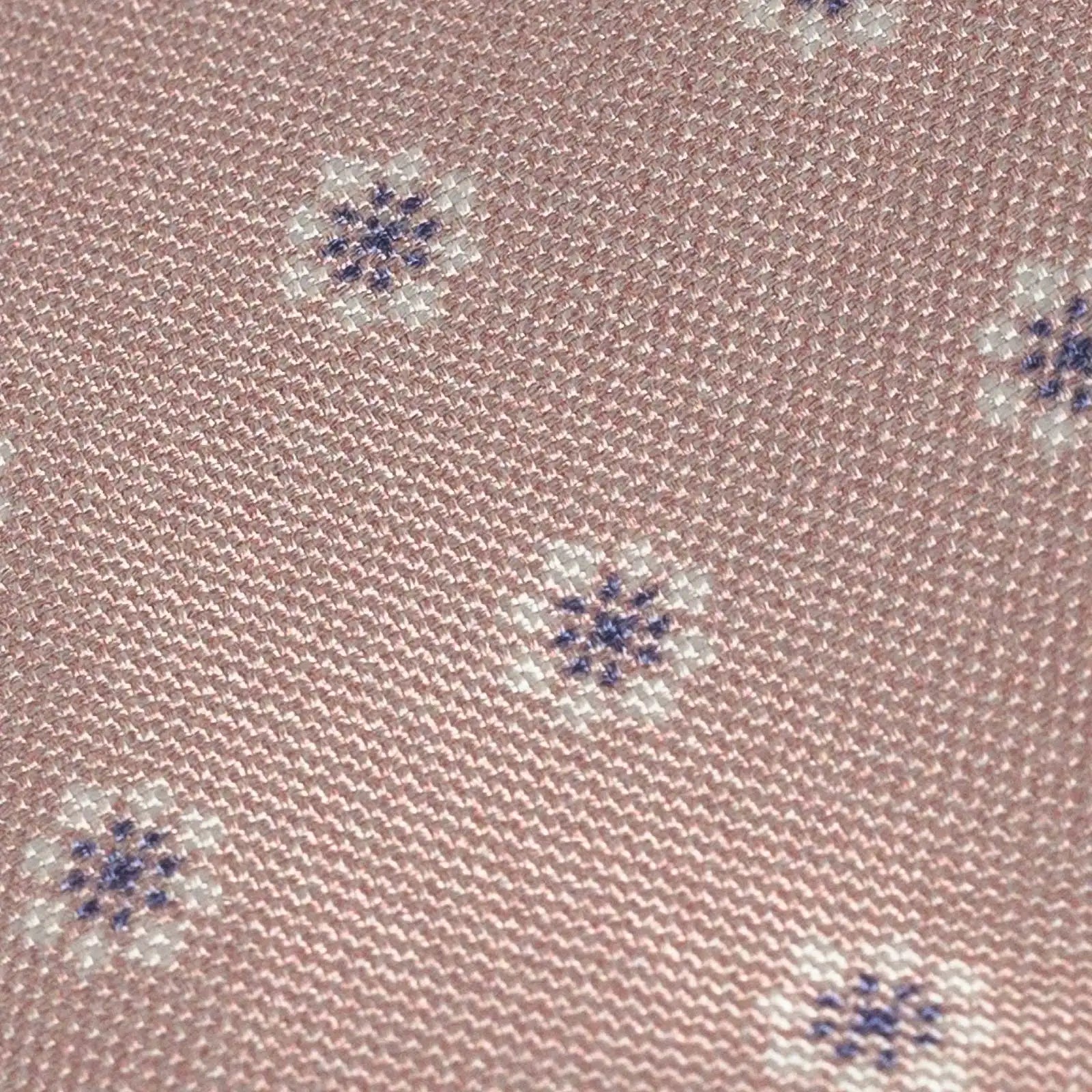 Close-up of Ledbury Light Pink Moretti Floral Silk Tie showing printed floral pattern and sheen