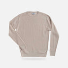 A light beige ribbed knit crewneck sweater with long sleeves, displayed flat against a light gray background.