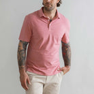 Model wearing the Ledbury Freeman Knit Custom Polo in Washed Red
