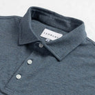 Close-up of the collar on the Ledbury Freeman Knit Custom Polo in Bay Blue
