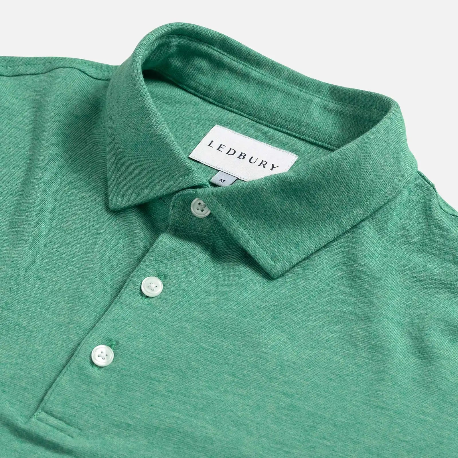 Close-up of the collar on the Ledbury Freeman Knit Custom Polo in Parakeet Green

