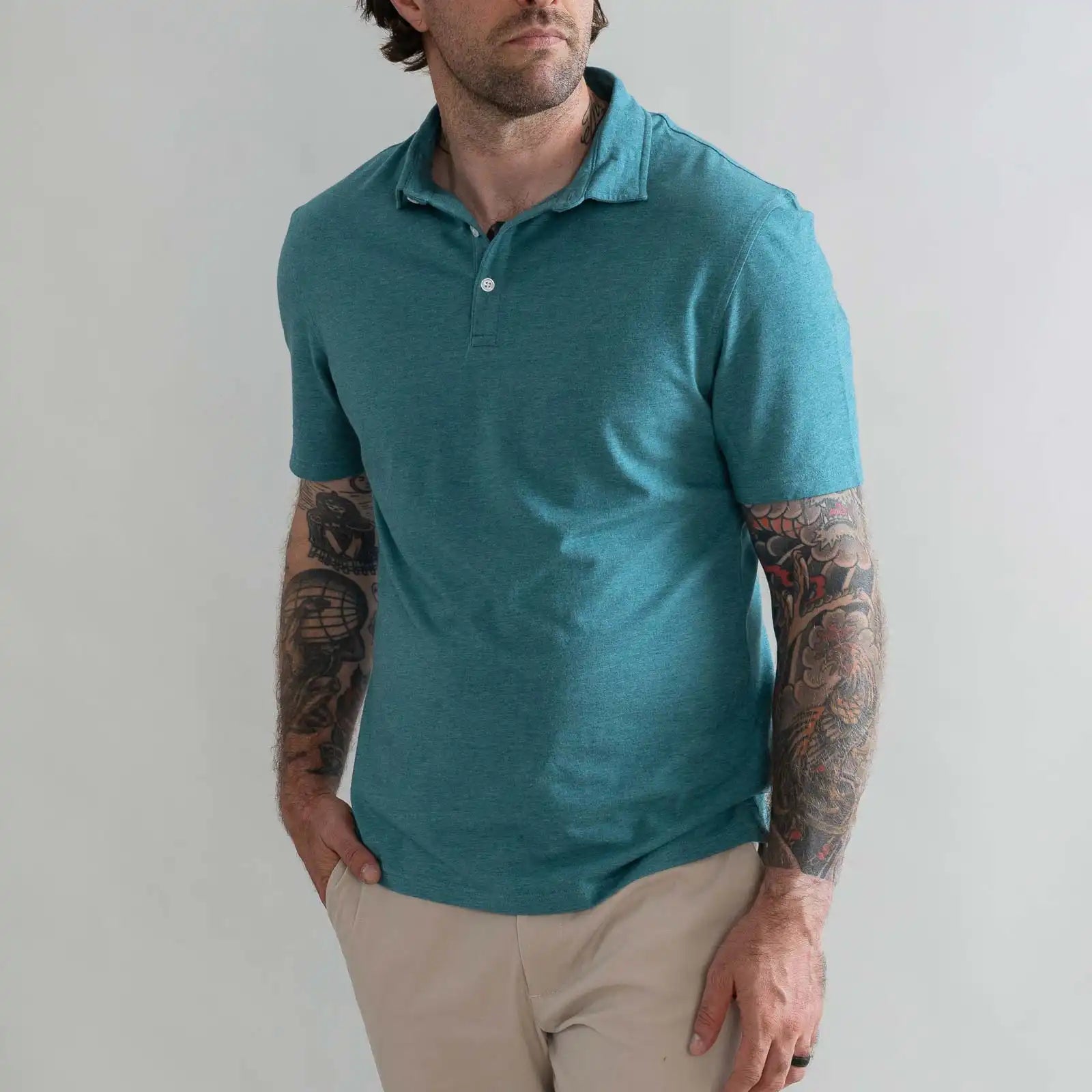 Model wearing the Ledbury Freeman Knit Custom Polo in Teal
