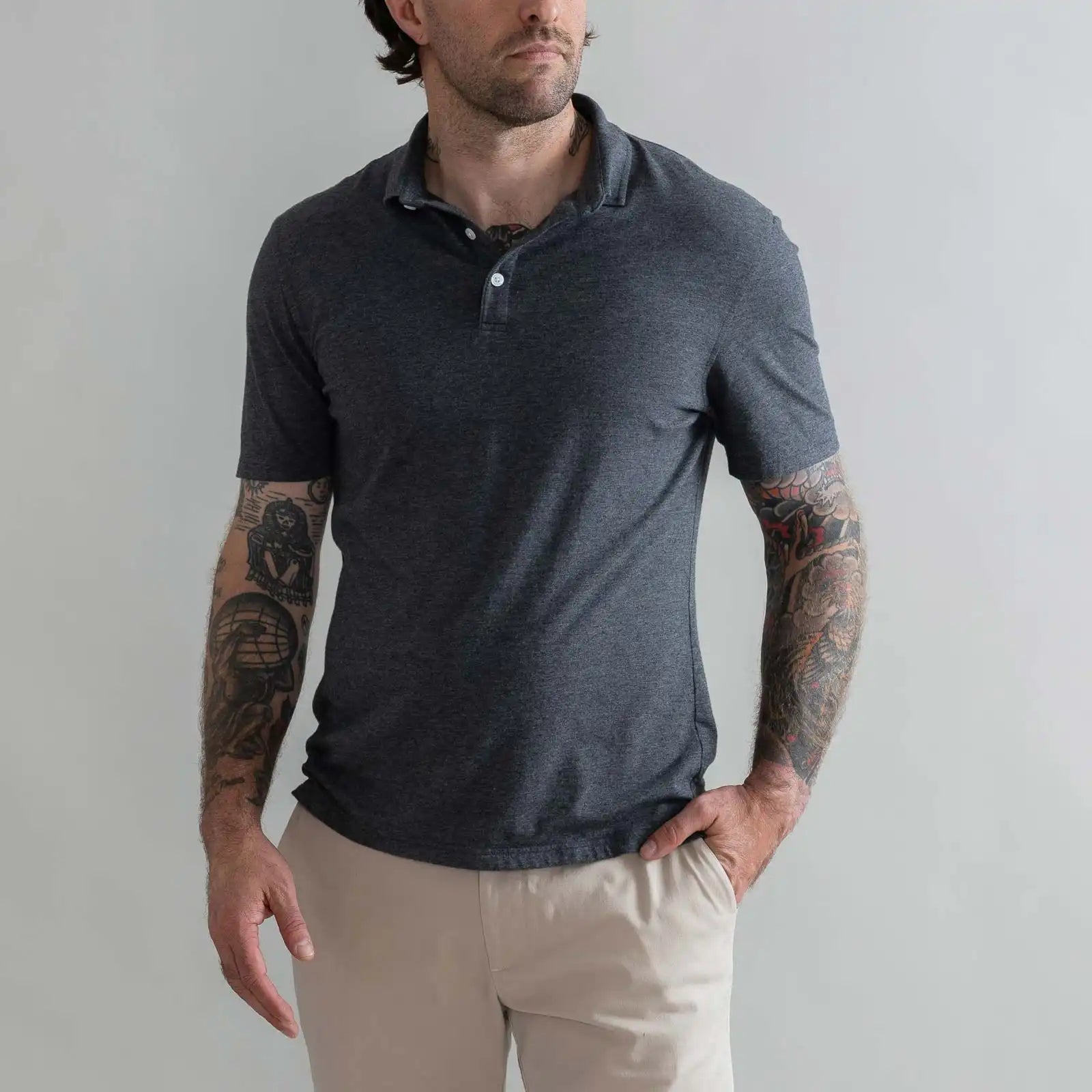 Model wearing the Ledbury Freeman Knit Custom Polo in Charcoal Grey
