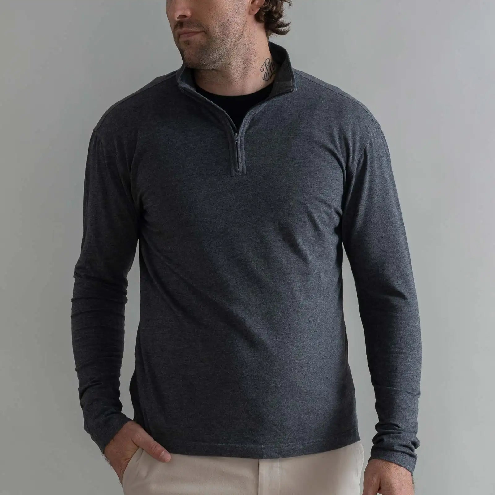Man wearing Ledbury Freeman Sport Quarter Zip in Charcoal Grey with khaki trousers