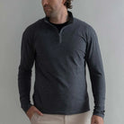 Man wearing Ledbury Freeman Sport Quarter Zip in Charcoal Grey with khaki trousers