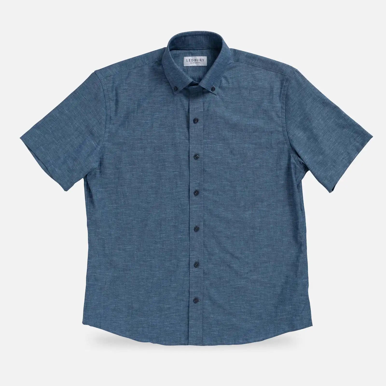 Medium Blue Sandoval Oxford Chambray short sleeve shirt laid flat — slub cotton fabric detail, Ledbury