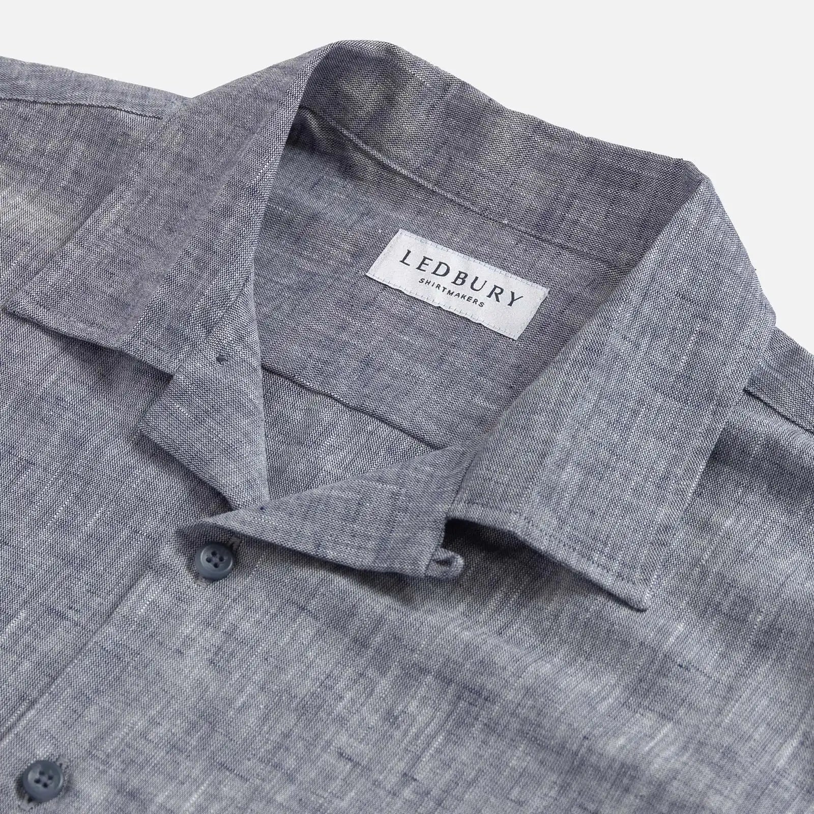 Camp collar detail on the Navy Blue Sandoval — open, flat-lying collar in slub cotton chambray