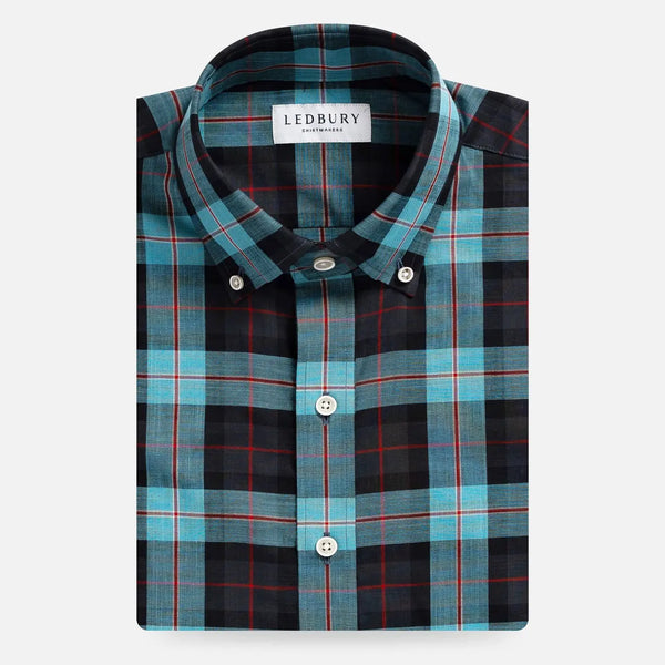 Ledbury Blue Albini Olson Plaid Custom Shirt folded flat, teal and navy plaid with red accents, button-down collar