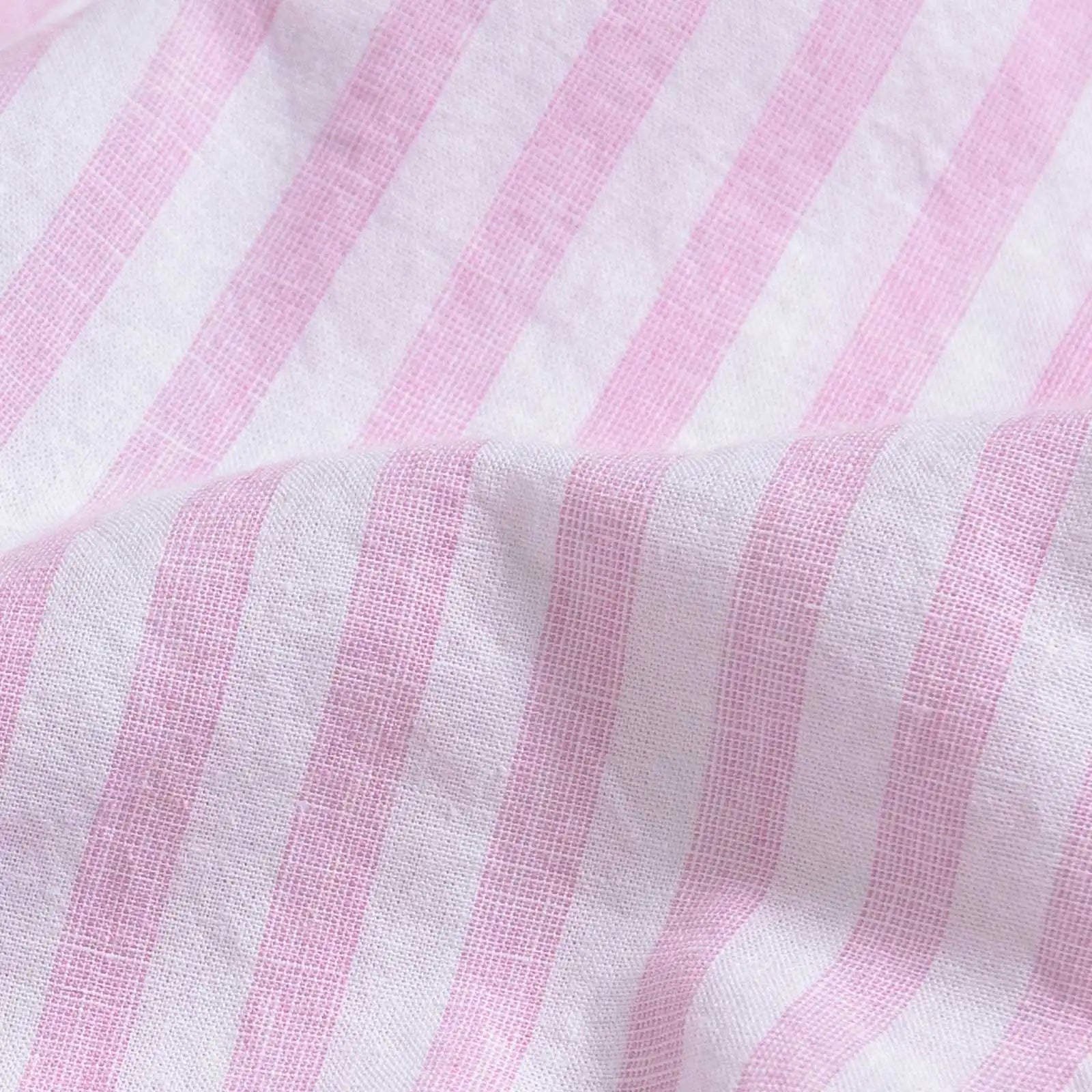 Pink Barretto stripe fabric close-up - speckled heather cotton linen texture