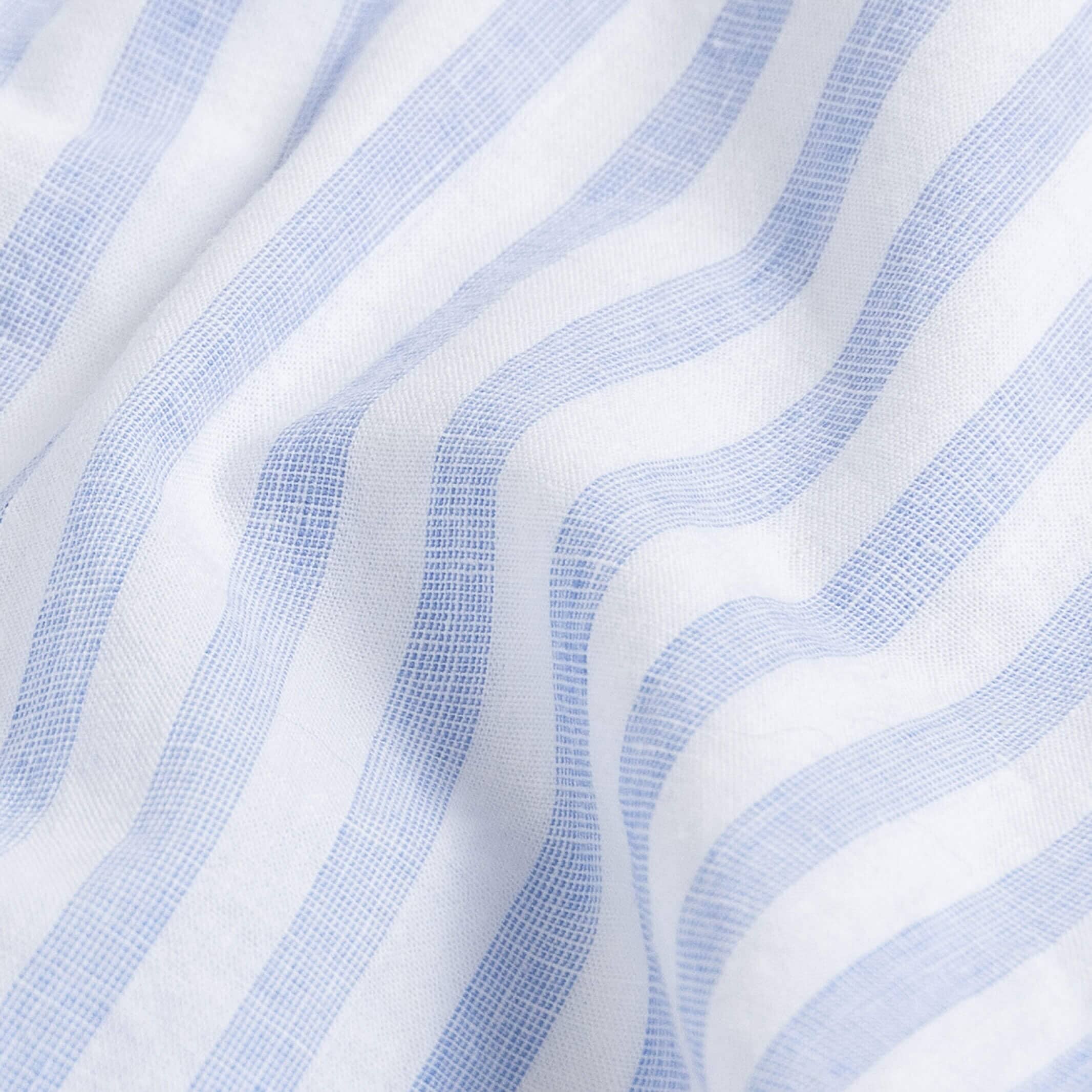 Blue Barretto stripe fabric close-up - speckled heather cotton linen texture